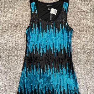 Beautiful sequin blue long top. Perfect over tights for a night out